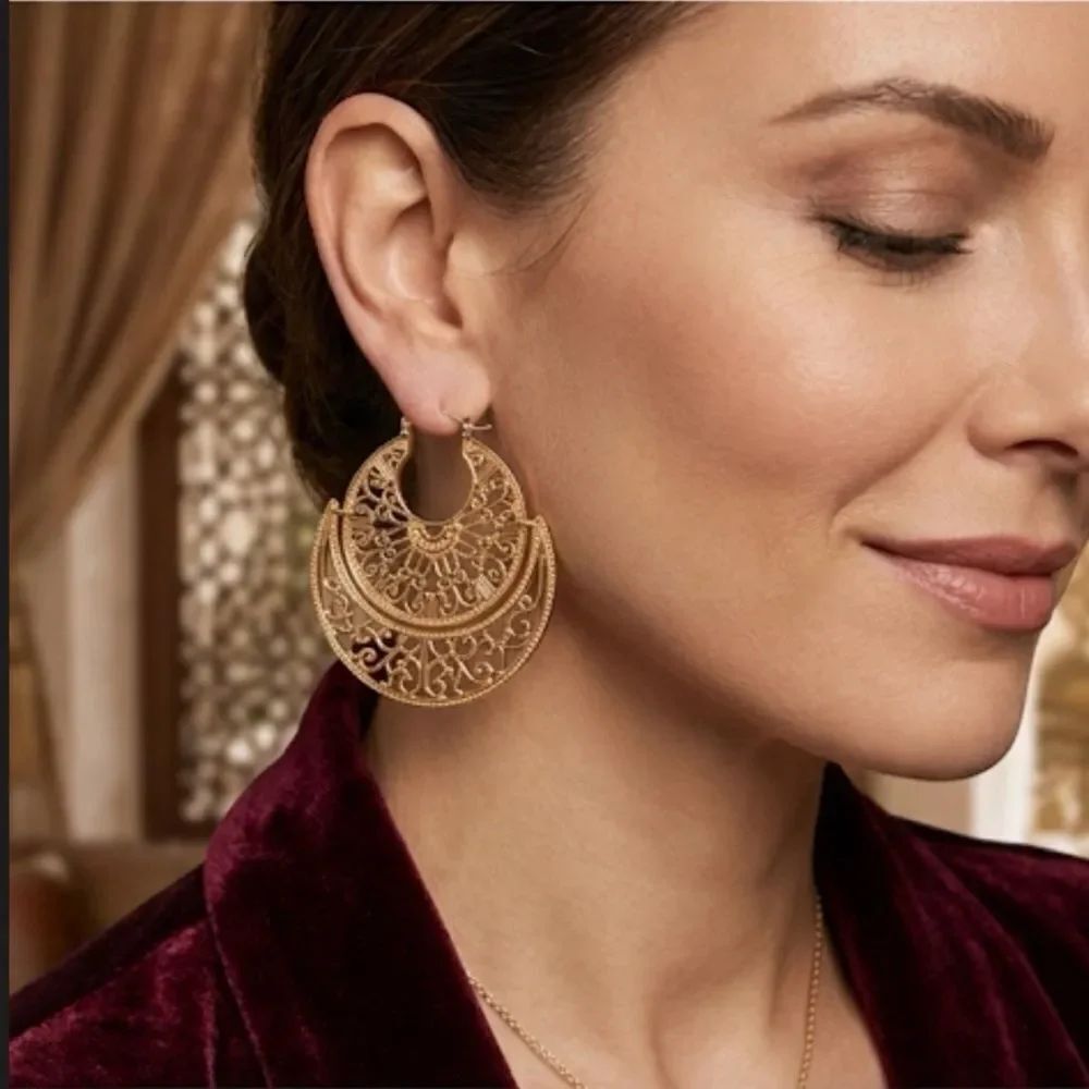 Large gold colored earrings 